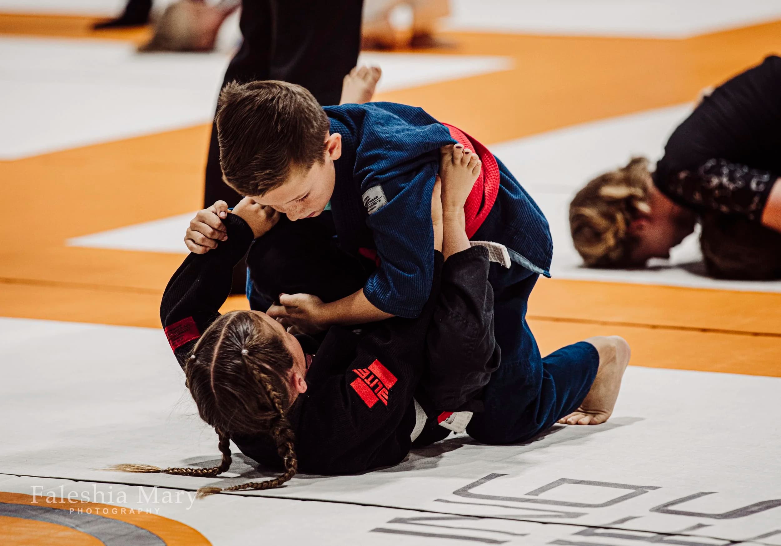 Two kids competing in a match